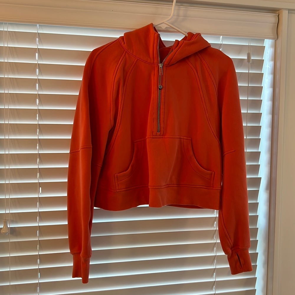 Bright tangerine Lululemon cropped sweatshirt